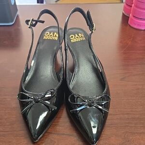 Elegant Black Patent Leather Heels with Bow Detail